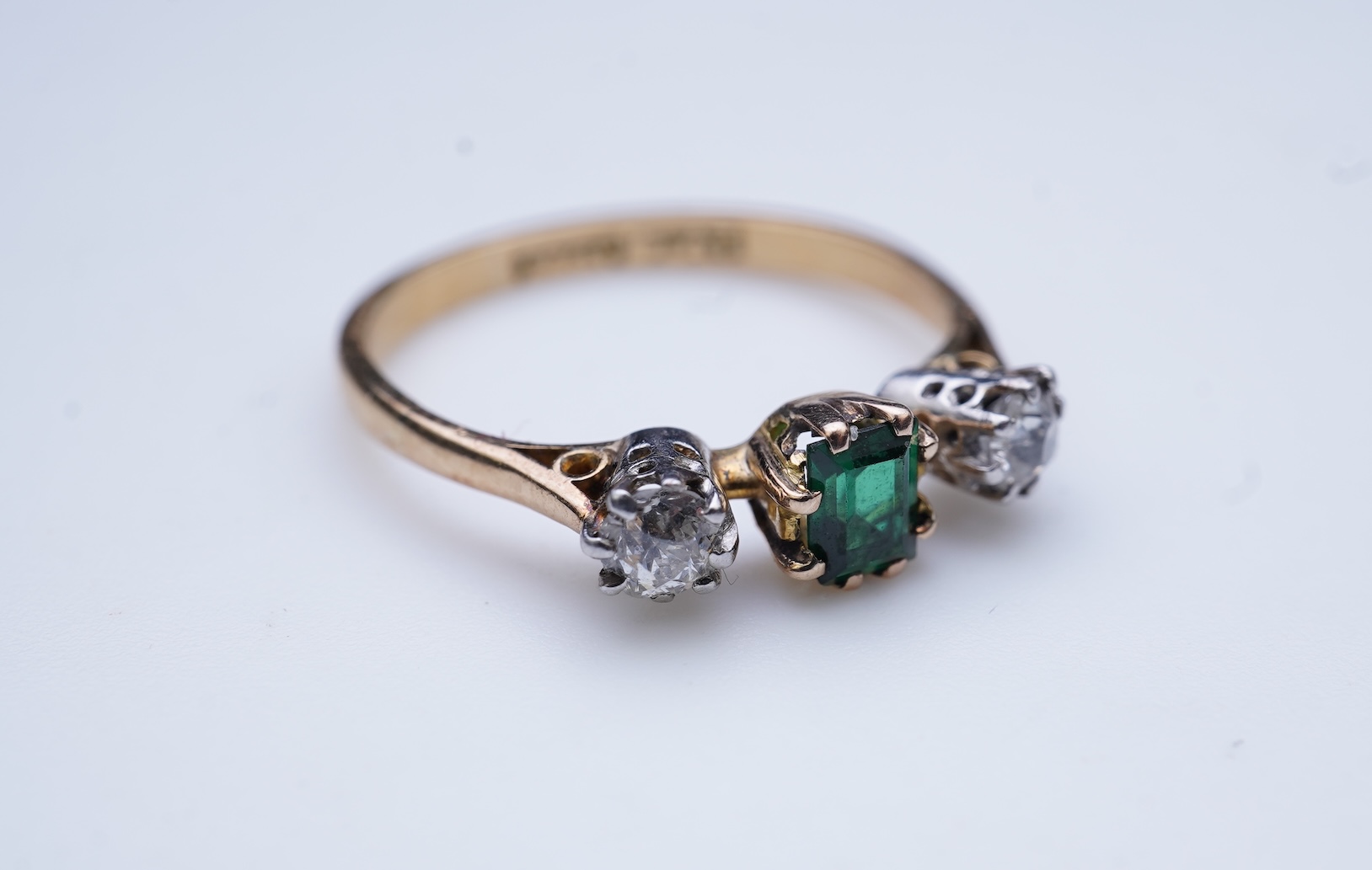 A tsavorite and diamond ring